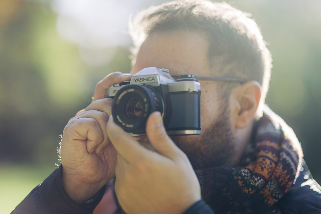 Photographer with Yashica SLR